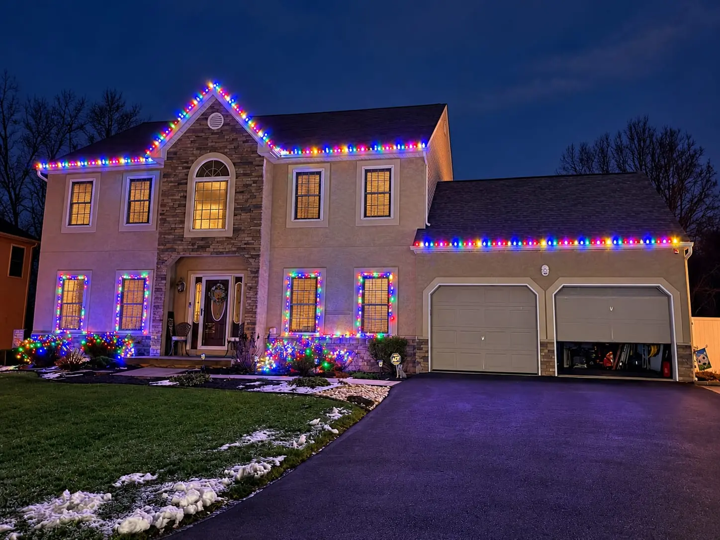 SZNS holiday lighting installation on a colonial home in Easton, PA.
